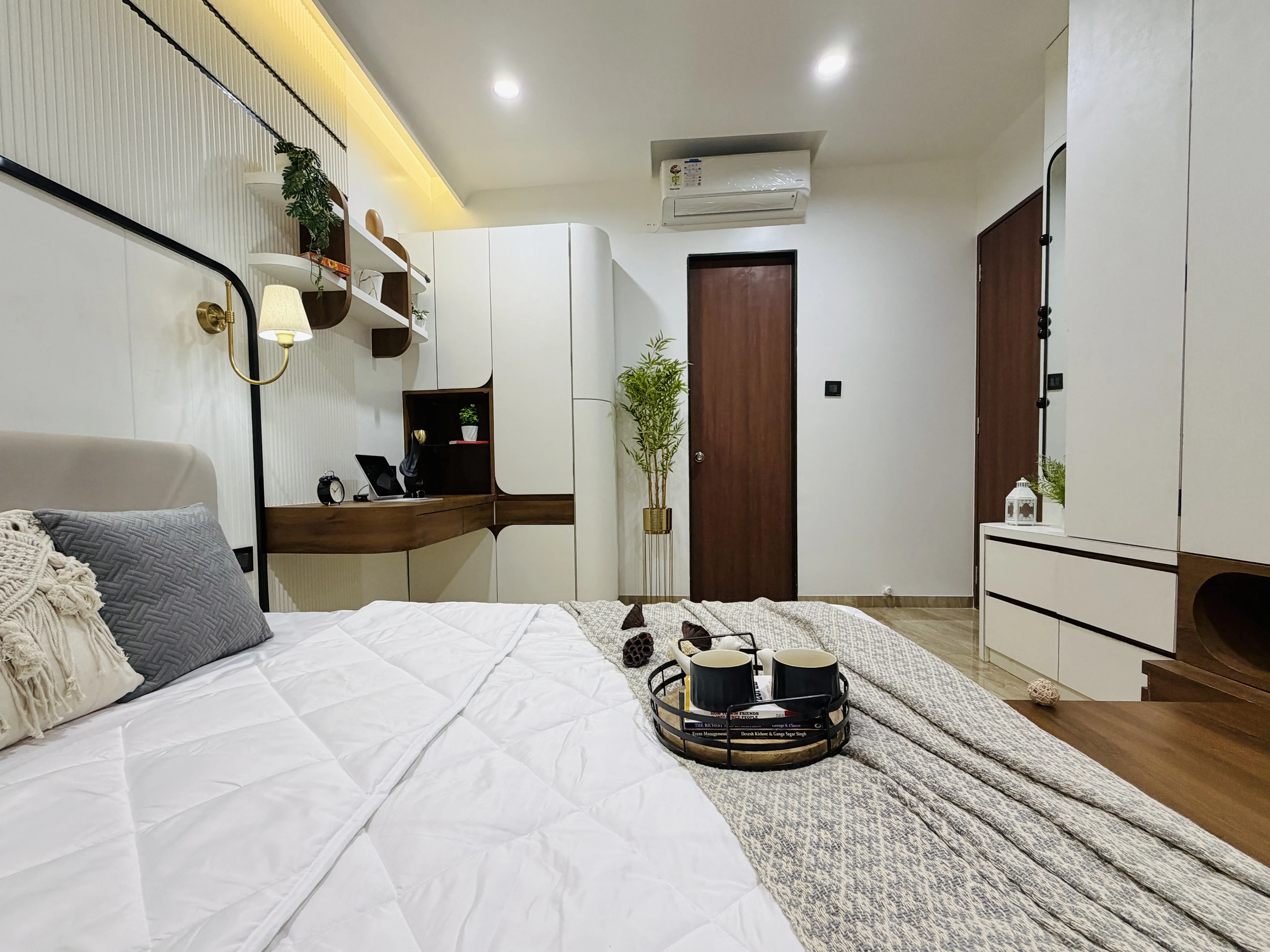 Living space with custom wardrobe and ambient lighting
