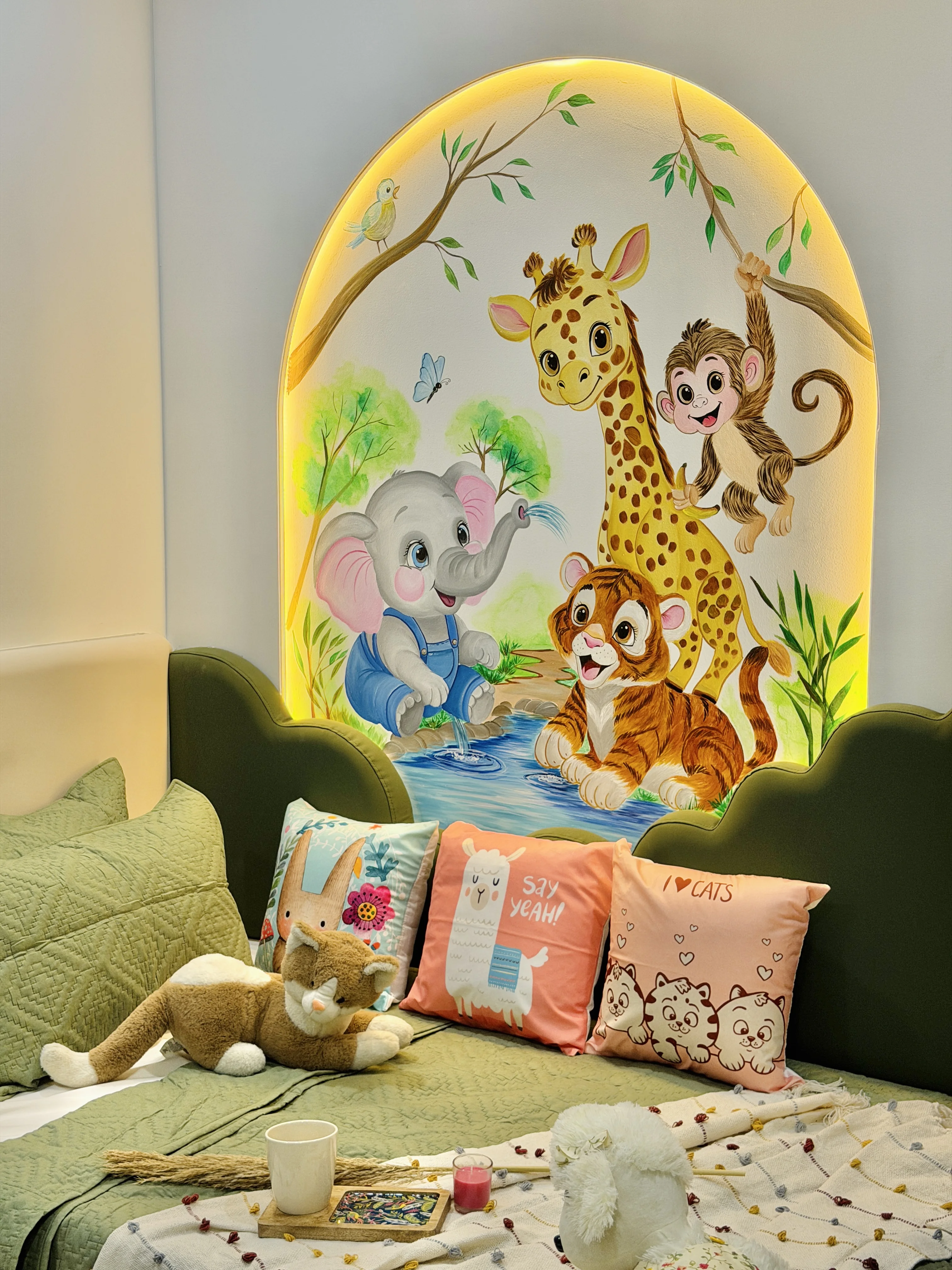 Hand-painted jungle mural in the children's bedroom