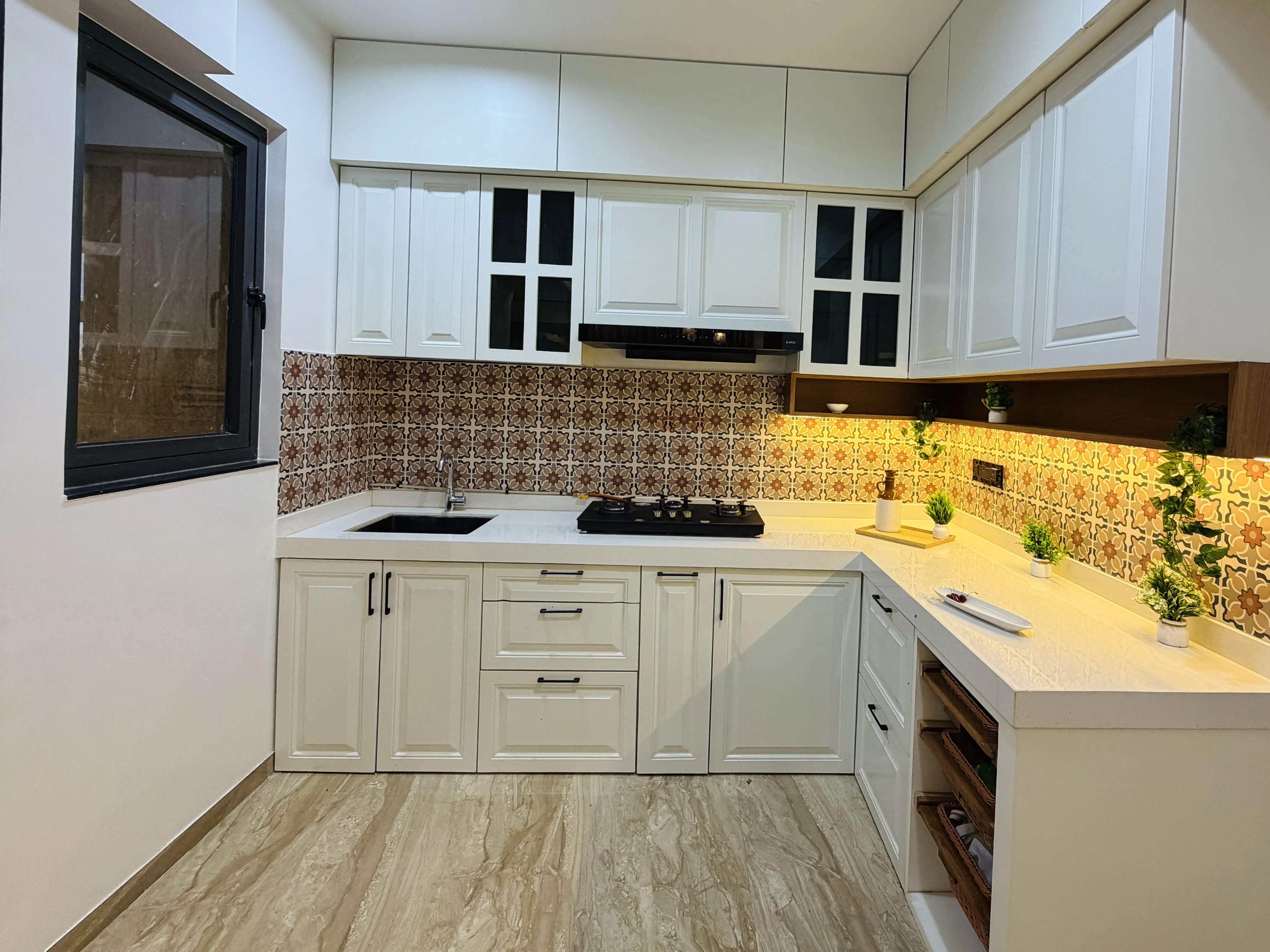 Modern modular kitchen with warm under-cabinet lighting